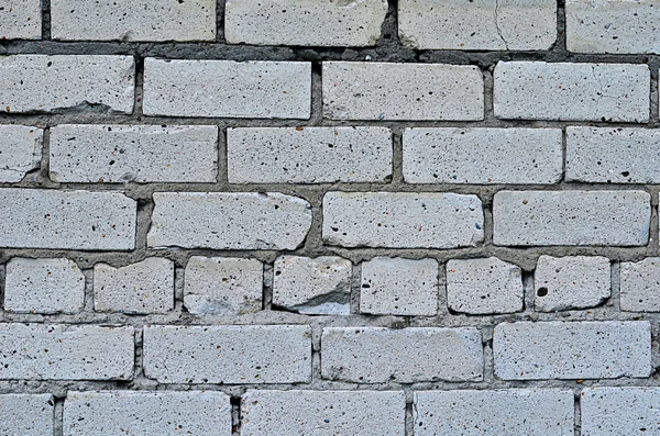 Wall from white brick close up