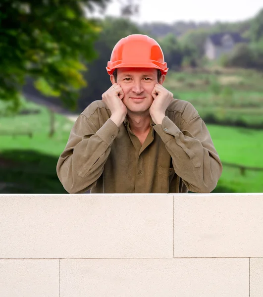 Builder with hard hat