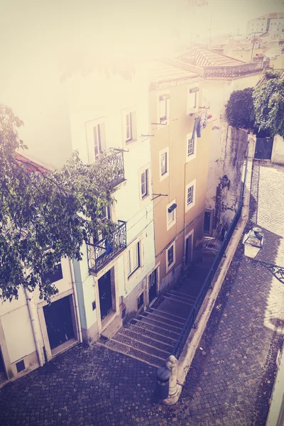 Retro vintage filtered picture of empty street in Lisbon, Portug