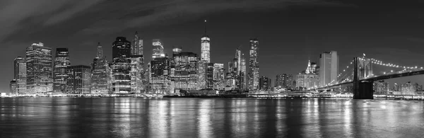 Black and white New York City at night panoramic picture, USA.