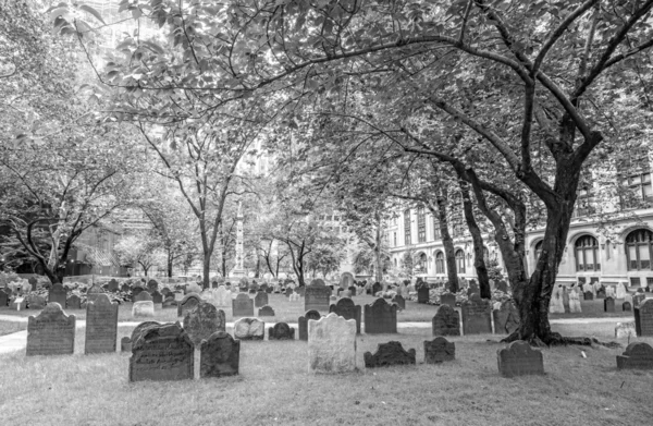 Black and white picture of gravestones in Trinity Church Cemetery.