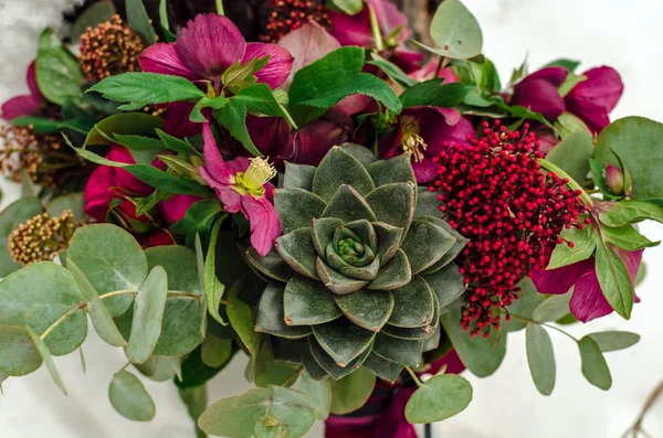 Bridal bouquet with red and burgundy colors