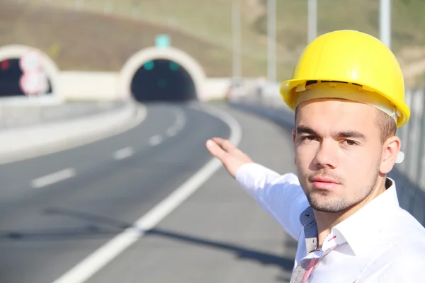 Young engineer near the tunnel