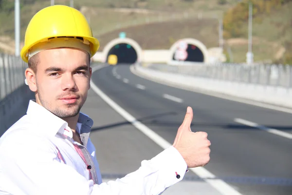 Young engineer near the tunnel