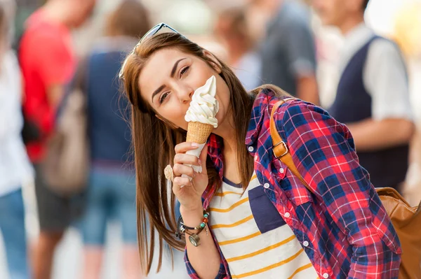 Woman eating Ice cream on vacation travel.