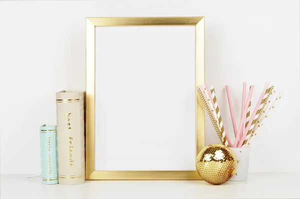 Golden picture frame with decorations.