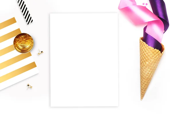 Flat lay, white background. Party photo, ice scream cone and pink, colored ribbons. White background mockup. Stationery