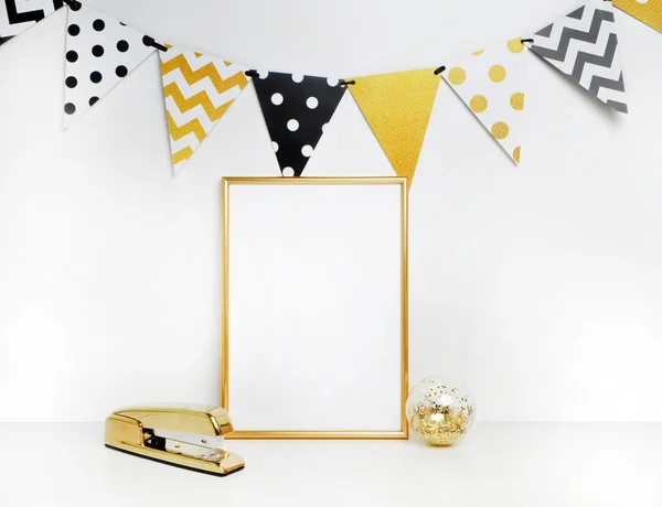 Mockup frame. Gold decoration. Gold frame and stapler. Festival flags, polka and chevron patterns