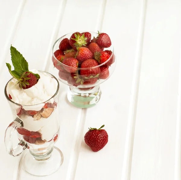 Dessert of strawberries, whipped cream and pastry