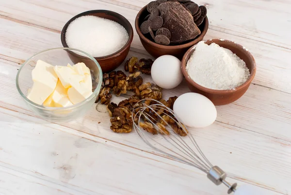 Ingredients for a batch of homemade chocolate cake brownie