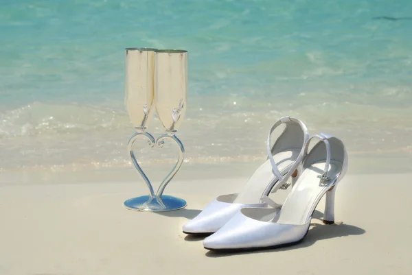 Bridal shoes and wedding glasses