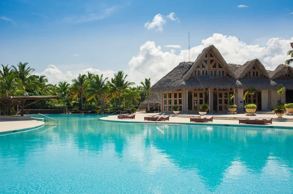 Outdoor Swimming pool of luxury hotel resort near the sea. Tropical Paradise. spa resort. Dominican Republic, Seychelles, Caribbean, Bahamas.
