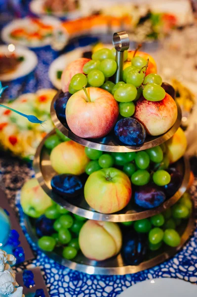 Catering table set service with silverware and glass stemware at restaurant before party