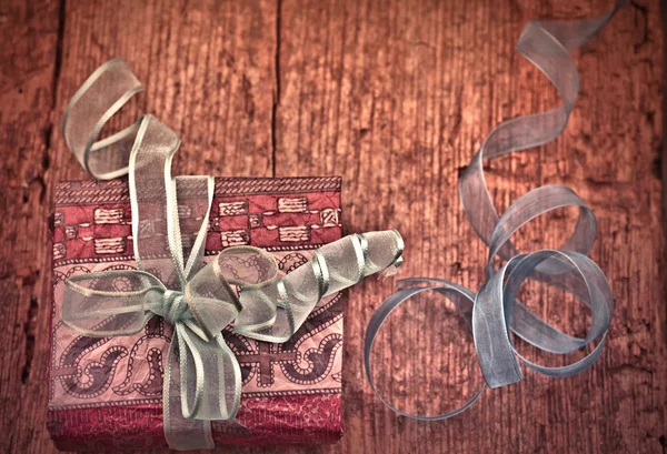 Christmas gift box  with decorative tapes