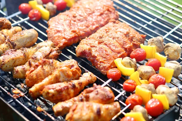 Assorted meat on grill