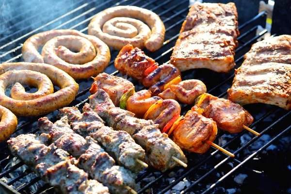 Assorted meat on grill
