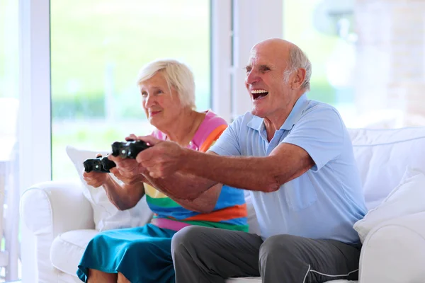 Senior couple having fun at home