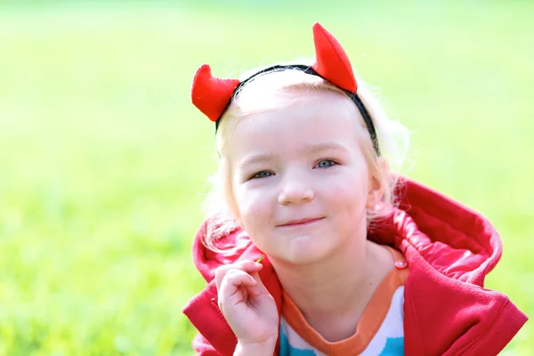 Happy preschooler girl enjoying Halloween