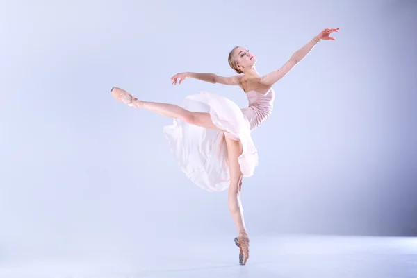 Modern Ballerina dancing in the studio