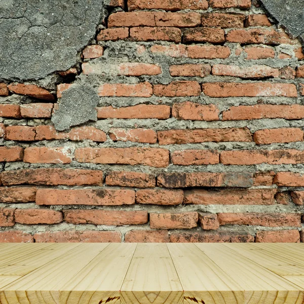 Plain Wood Table With Hipster Brick Wall Background.
