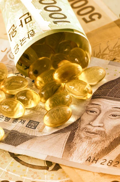 Current Use of South Korean Won Currency and Medicine in Korean Healthcare Business Concept.