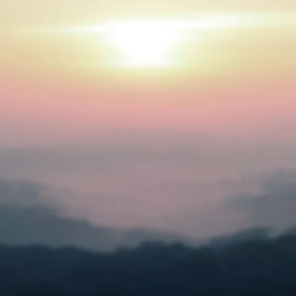 Blurred Sunrise Background of Early Morning Light with Mountain Landscape.