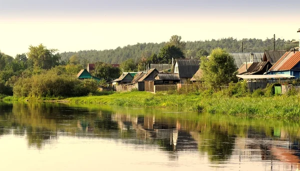 Village houses on the river bank