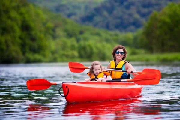 Mother and child in a kayak