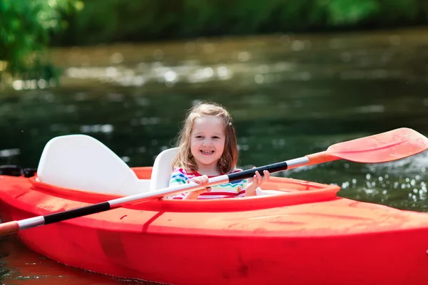 Little girl in a kayak