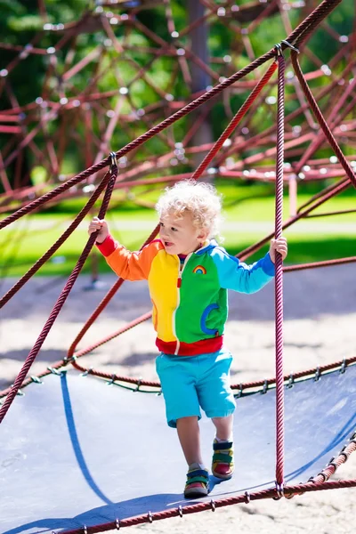 Child having fun on school yard playground