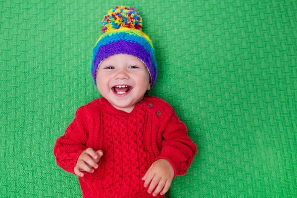 Little baby in warm knitted hat