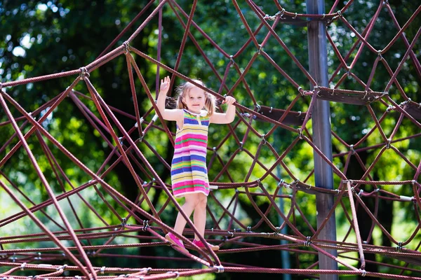 Child having fun on school yard playground