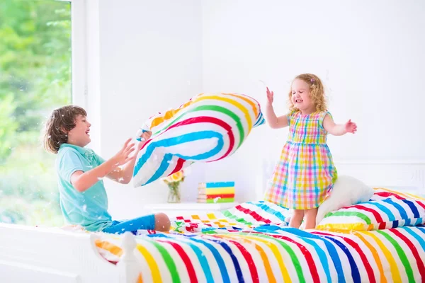 Kids having pillow fight