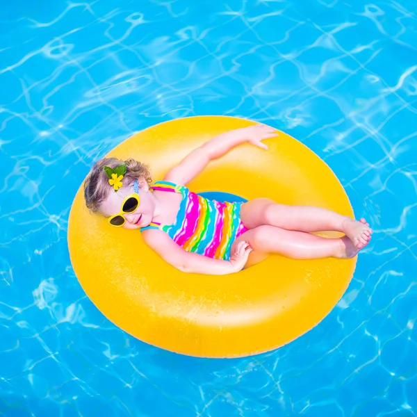 Little girl in a swimming pool