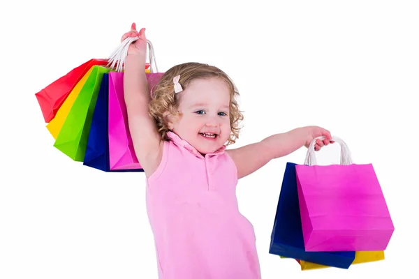 Little girl with shopping bags