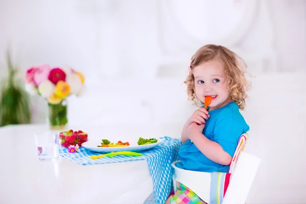 Little girl having lunch