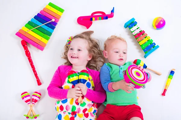 Kids with music instruments.