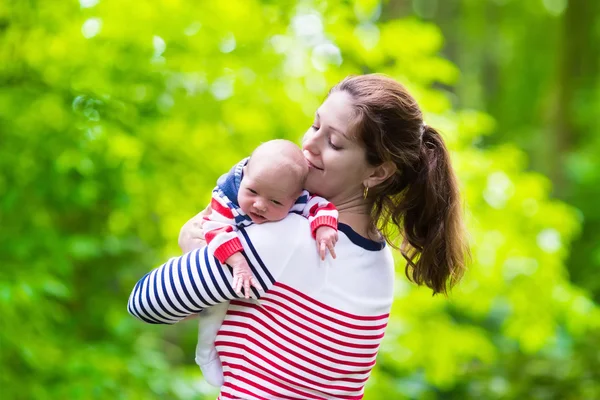 Mother and baby in a park