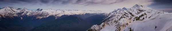 Snow-covered tops of mountains Sochi