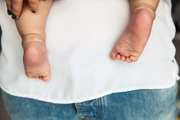 Little baby feet, close-up, square