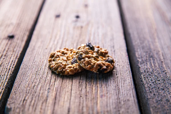 Cookies with chocolate on a wooden background. pastries, sweets, snack, food