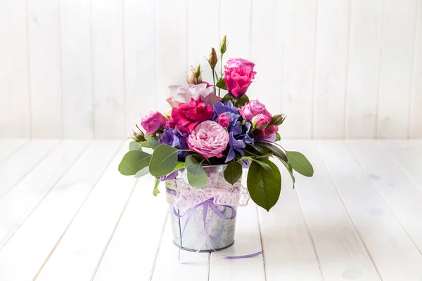 Flowers. bouquet of roses in a bucket