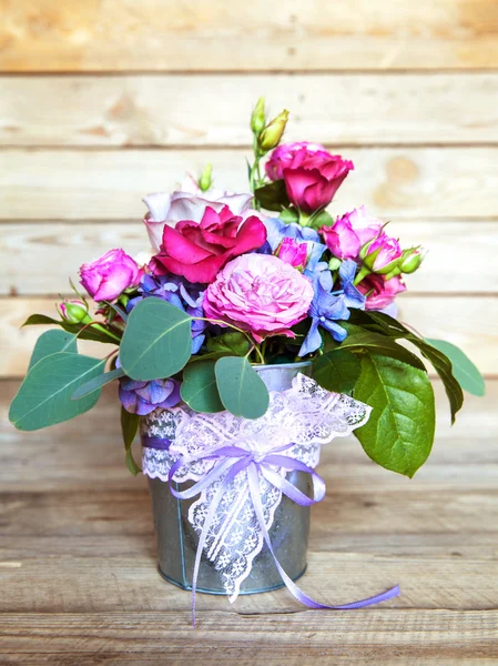 Flowers. bouquet of roses in a bucket