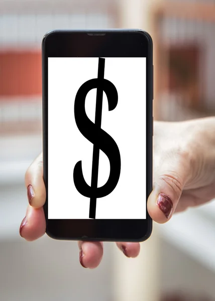 Mobile concept dollar sign: Woman hands with dollar sign in the