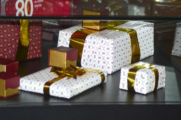Gifts covered with gold ribbon X International Exhibition of jewelery and watch brands JUNWEX Moscow Luxury