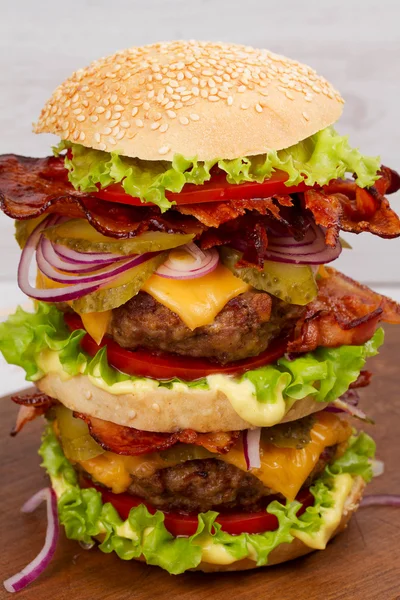Burger With Beef, Bacon, Tomato, Cheese, Lettuce and Onion