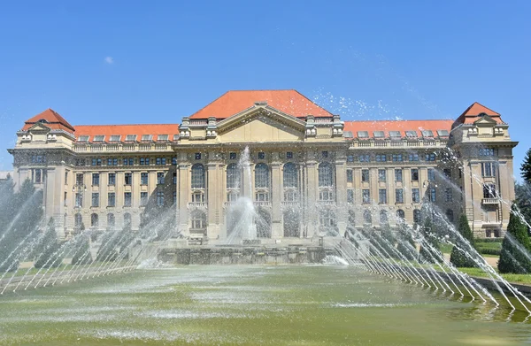 University building with fountain