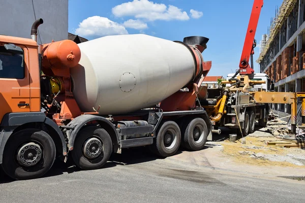Cement mixer truck at the construction site