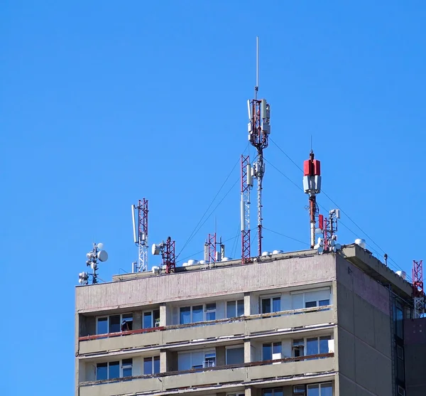 Antennas on the top of an apartment building