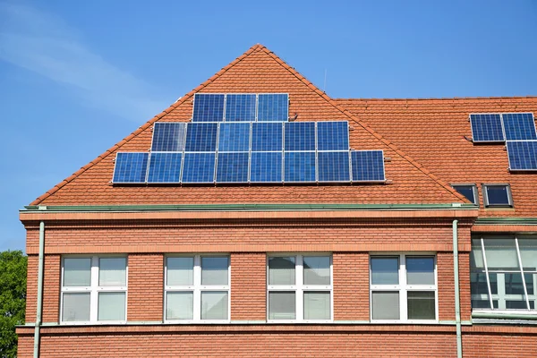 Solar penels on the roof of the school building